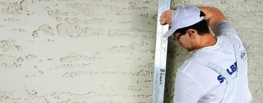 Co najpierw tynki czy wylewki? Uniknij kosztownych błędów w budowie